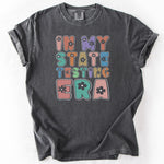 Gray graphic t-shirt with colorful In My State Testing Era print.