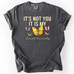 Gray graphic t-shirt with butterfly and text design.