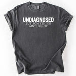 Gray, short-sleeve t-shirt with UNDIAGNOSED BUT SOMETHING AIN&