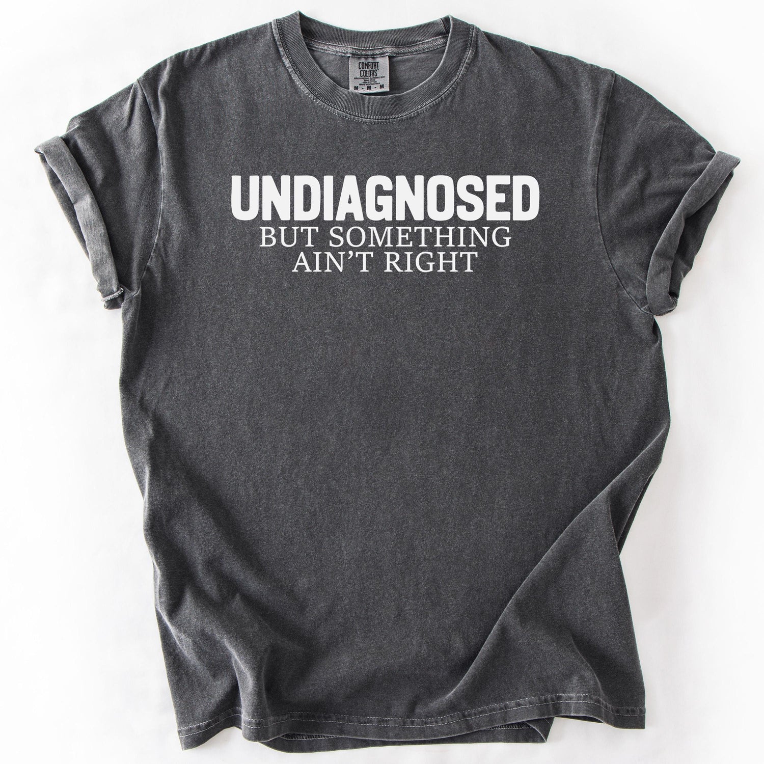 Gray, short-sleeve t-shirt with UNDIAGNOSED BUT SOMETHING AIN'T RIGHT text.
