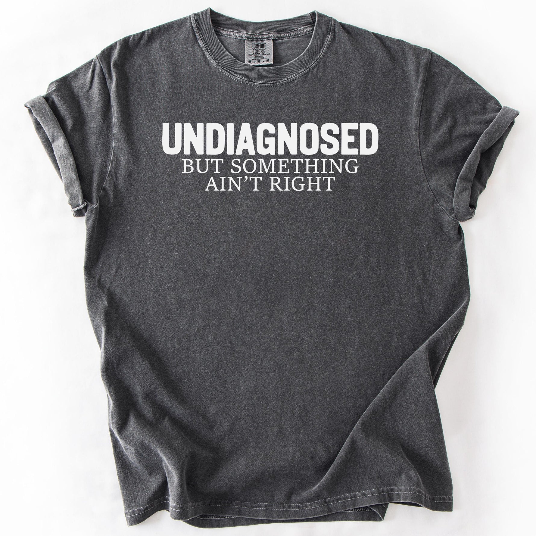 Gray, short-sleeve t-shirt with UNDIAGNOSED BUT SOMETHING AIN'T RIGHT text.