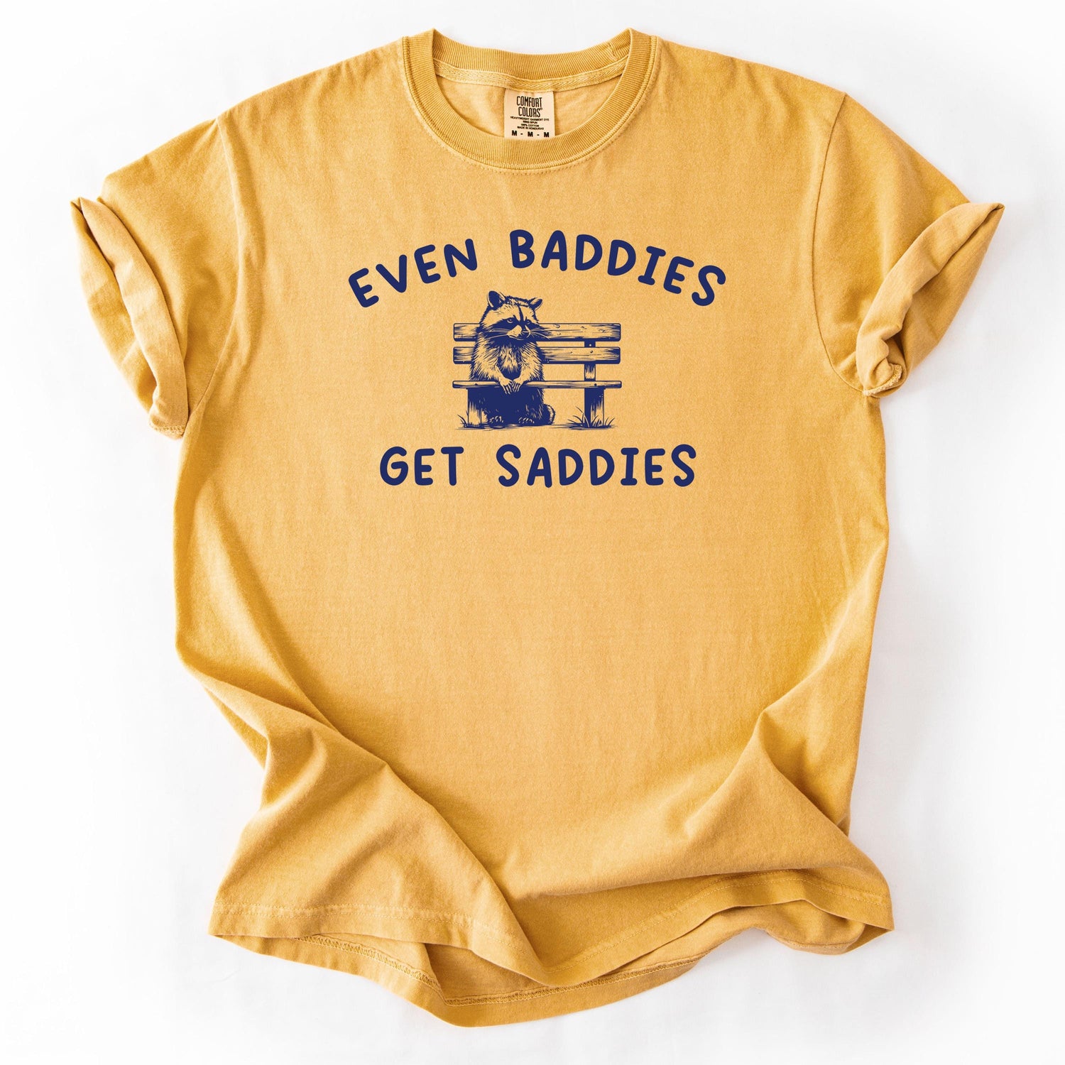 Yellow graphic t-shirt with Even Baddies Get Saddies text.