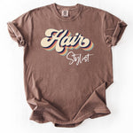 Brown, short-sleeve t-shirt with Hair Stylist graphic.