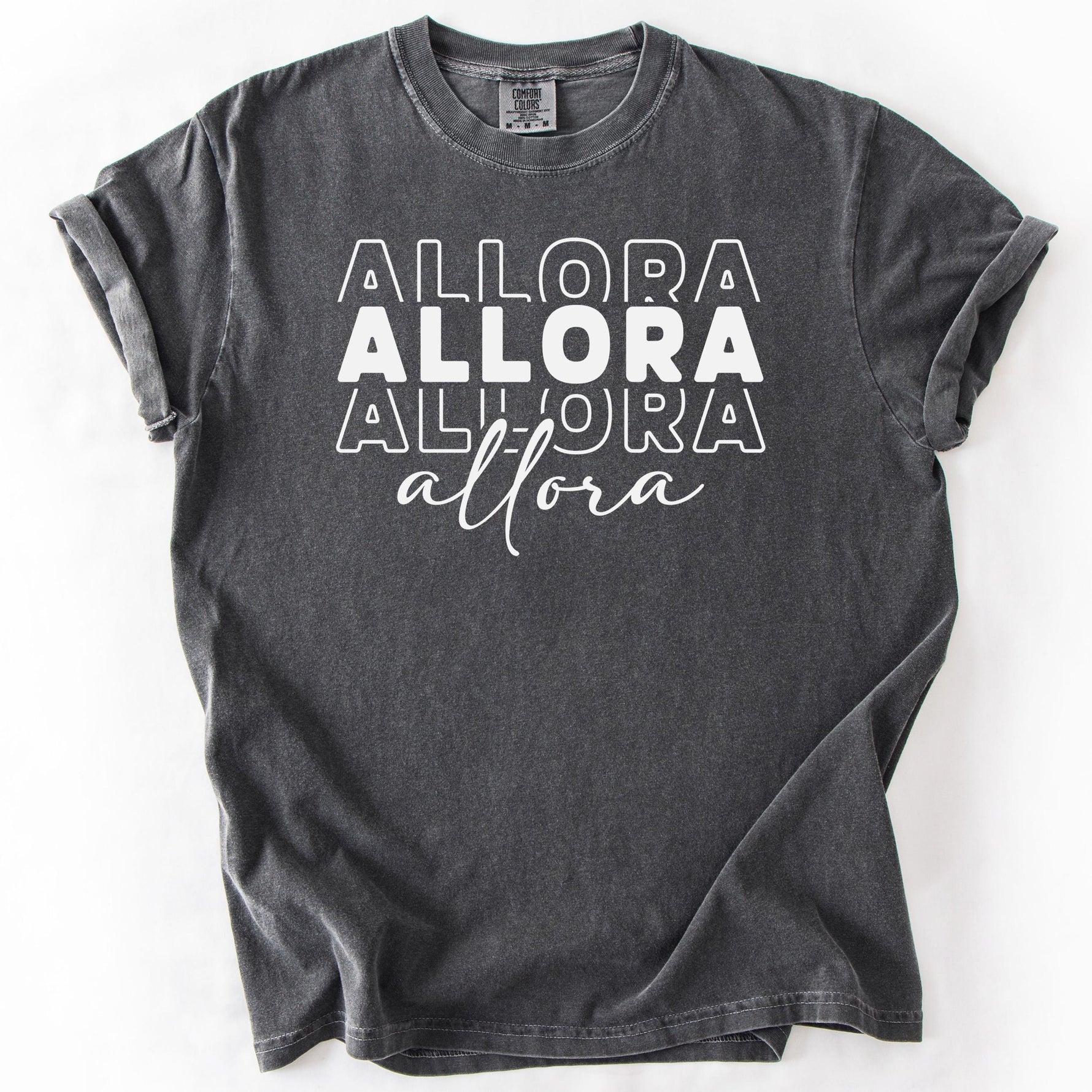 Gray graphic t-shirt with ALLORA text design.