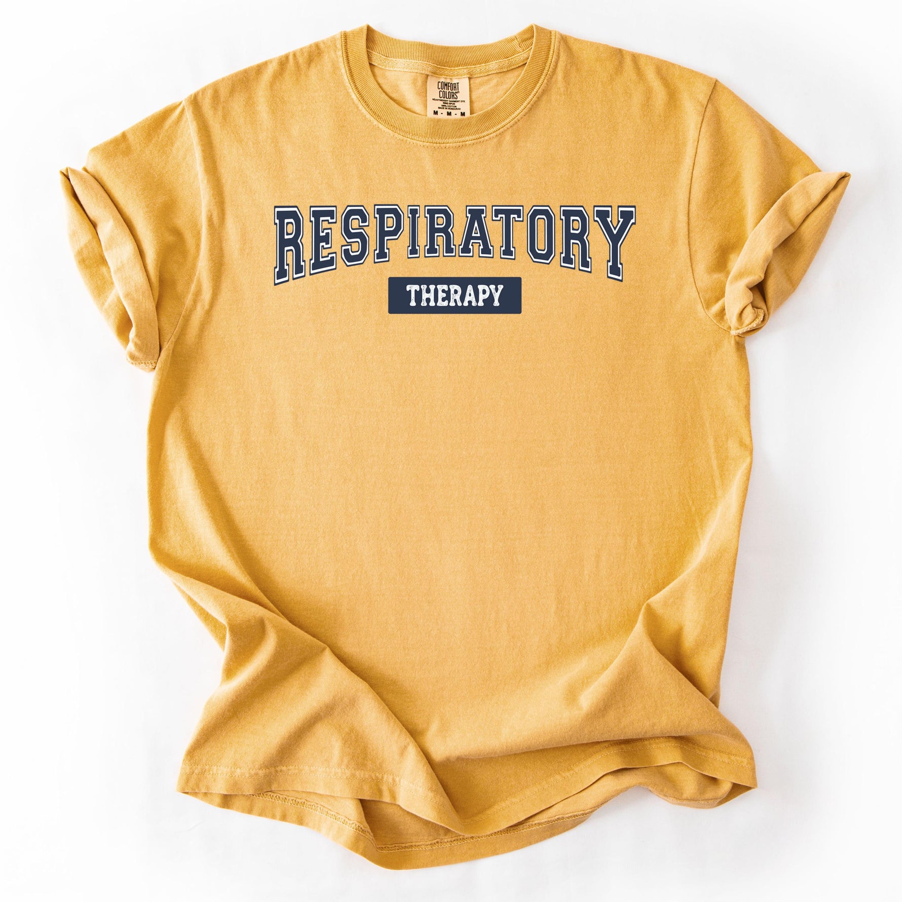 Mustard yellow, short-sleeve t-shirt with RESPIRATORY THERAPY print.