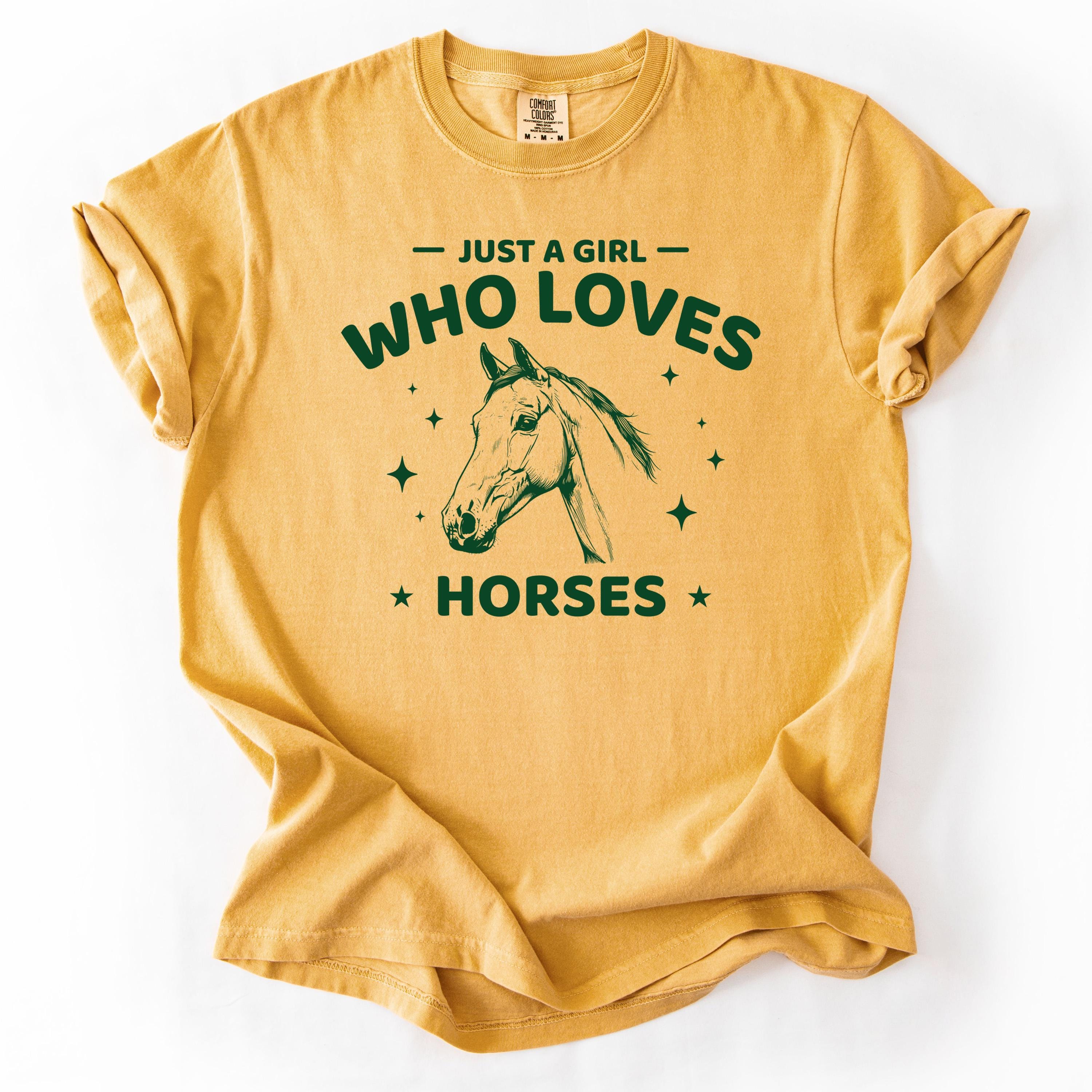 Mustard yellow t-shirt with horse graphic and text Just a Girl Who Loves Horses.